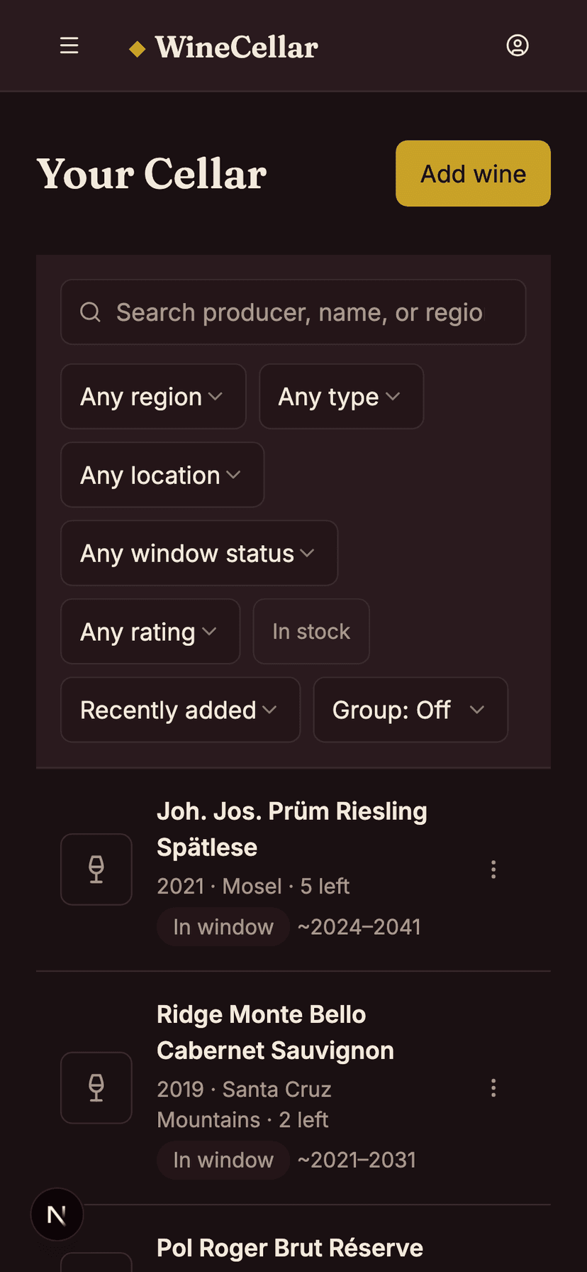 WineCellar inventory list showing bottles grouped by region on a phone